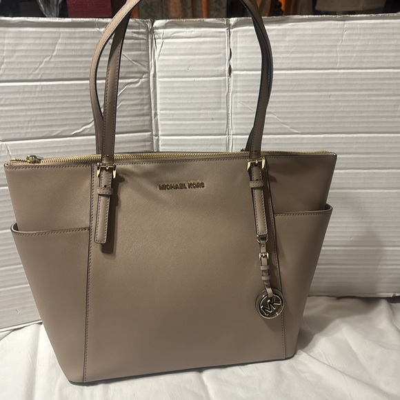 Michael Kors Beige Charlotte bag with adjustable straps.EUC - Picture 1 of 9